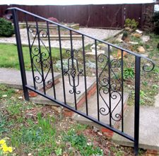 Hand rail with scrollwork